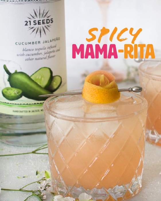 21Seeds Spicy Mama-Rita cocktail in a rocks glass garnised with an orange swirl.