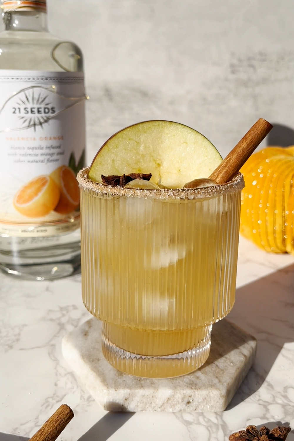 The Thanksgiving Punch. A cocktail with a hint of cinnamon and apple, perfect for a delightful evening.